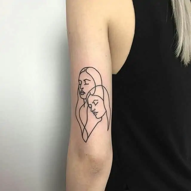 two girls fine line tattoos