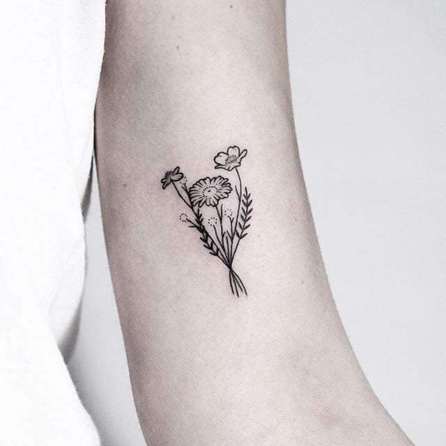 Flower tattoo - Visions Tattoo and Piercing