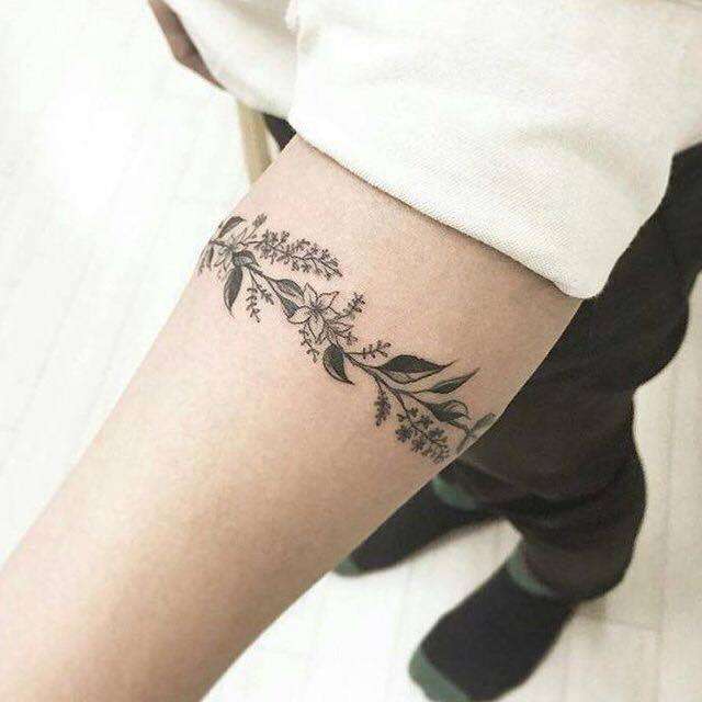 A Classic Arm Band Tattoo Design Of Leaves