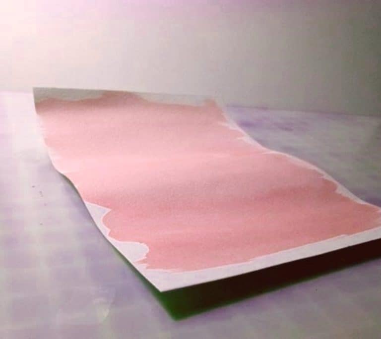 Why is it important to stretch your paper before painting?
