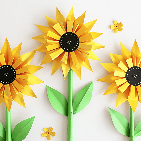 milkychoco04_Three_paper_folded_craft_sunflowers_with_green_ste_78f873f6-88a0-4b3d-98ba-7cf55ad2d8db