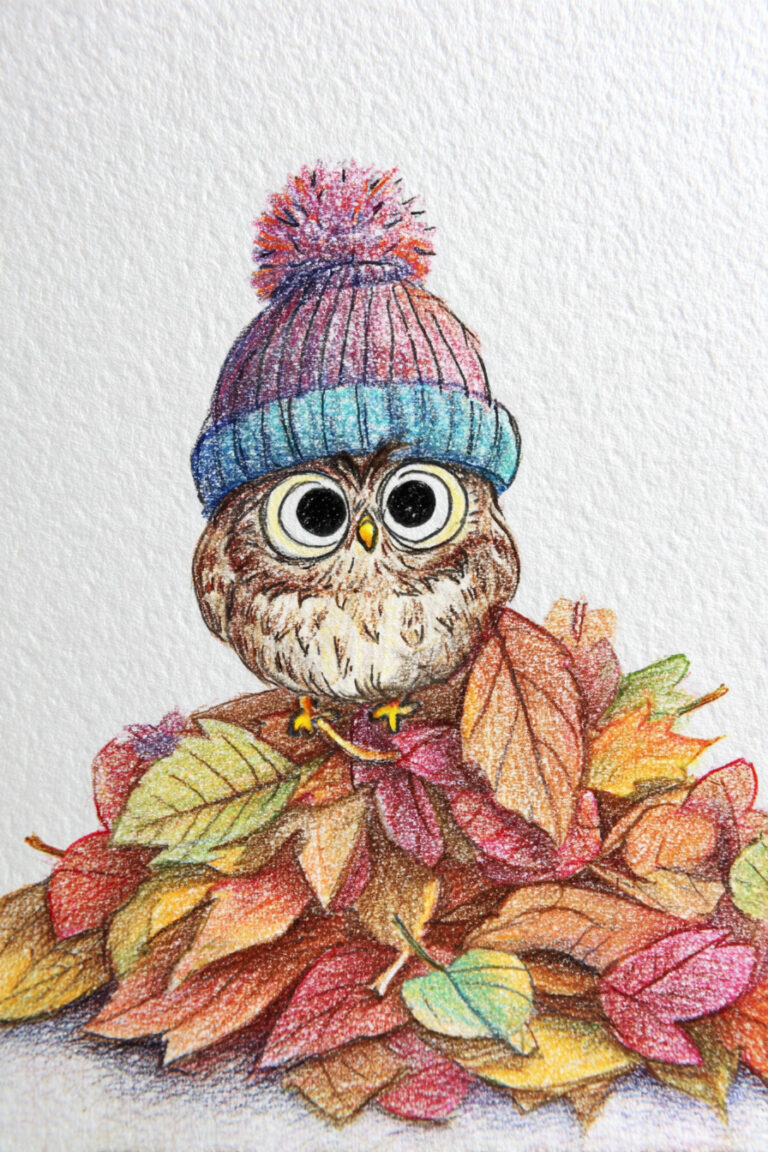 Owl Sitting in a Pile of Autumn Leaves