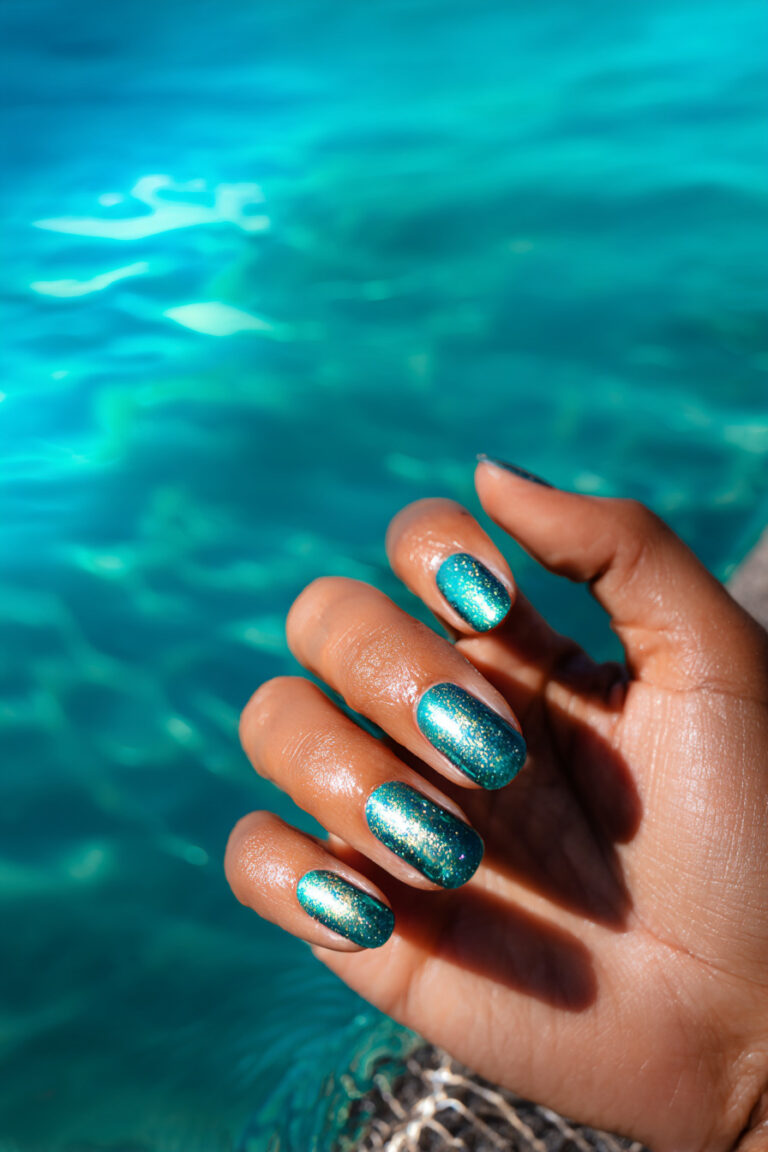15. Teal Jelly Nails with Mermaid Shimmer